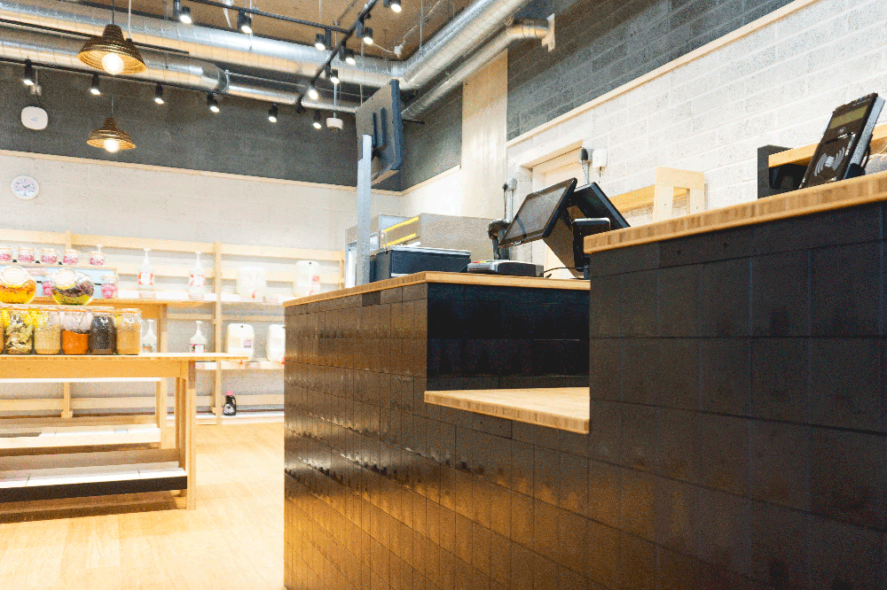 recycled coffee counter Retail Interior Designer